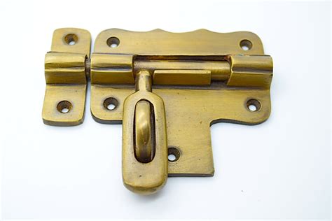 old metal lock box with brass door|antique metal door hardware.